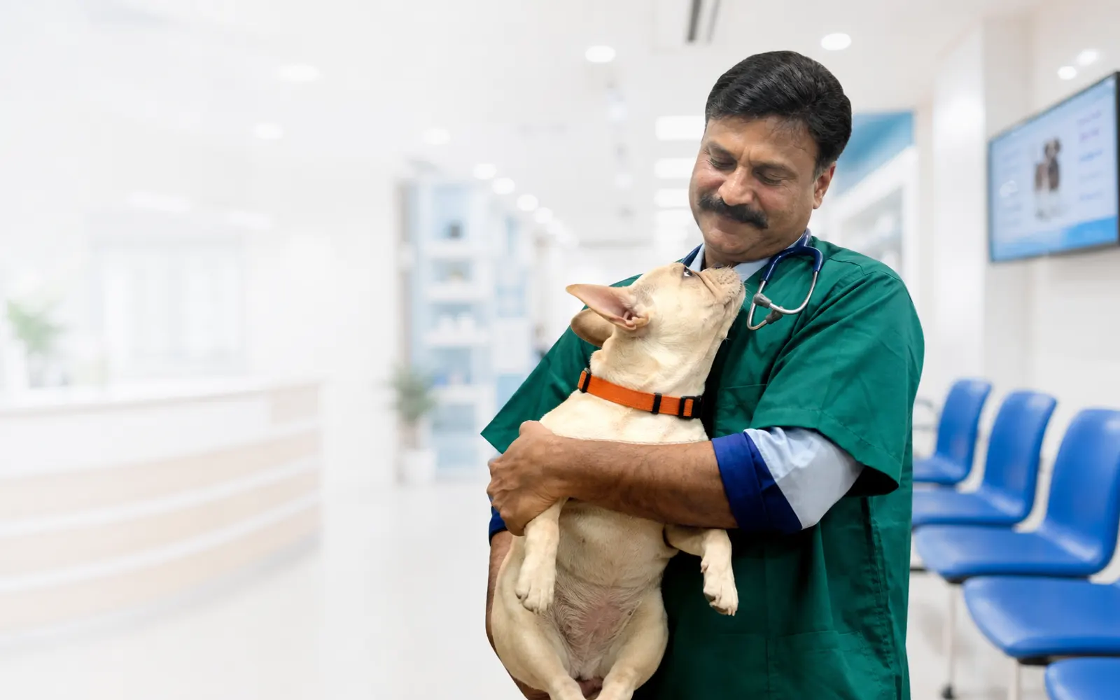 Dr. S. Sunil Kumar with a pet patient